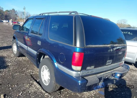 2000 GMC Jimmy Sle z USA, uszkodzony, nr VIN 1GKDT13W4Y2359595